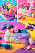 Fluffy faux fur tassel pencil case in pink and rainbow shown as pencil case, make-up bag and tech accessories pouch
