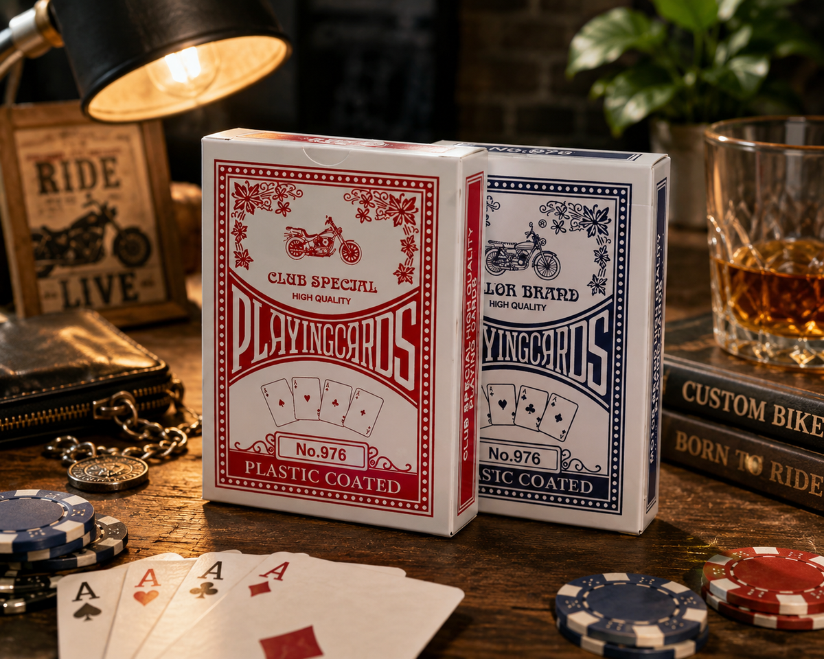 Club Special No.976 plastic coated playing cards in red and blue on a wooden table with poker chips