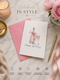 Happy Birthday card with pink champagne bottle and glasses illustration